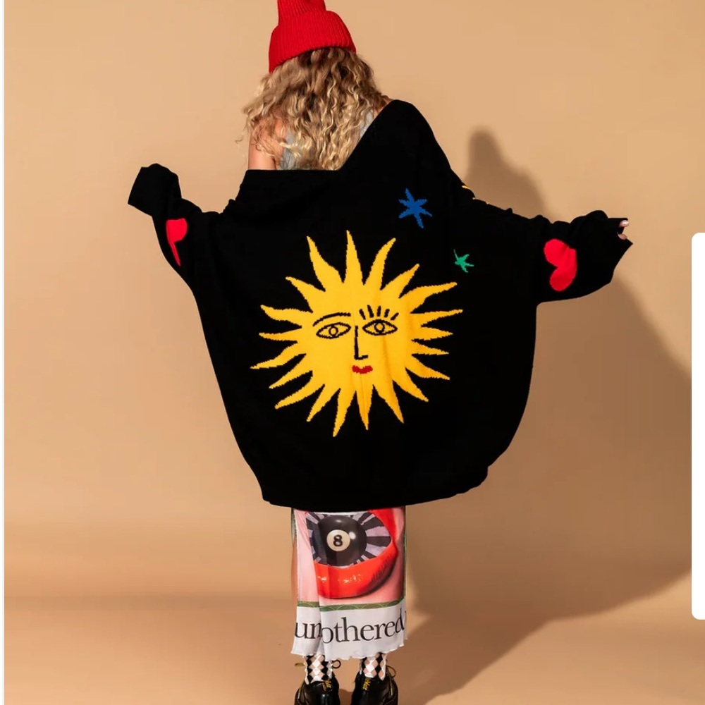 Dressed in LALA Black Sweater with Sun Design